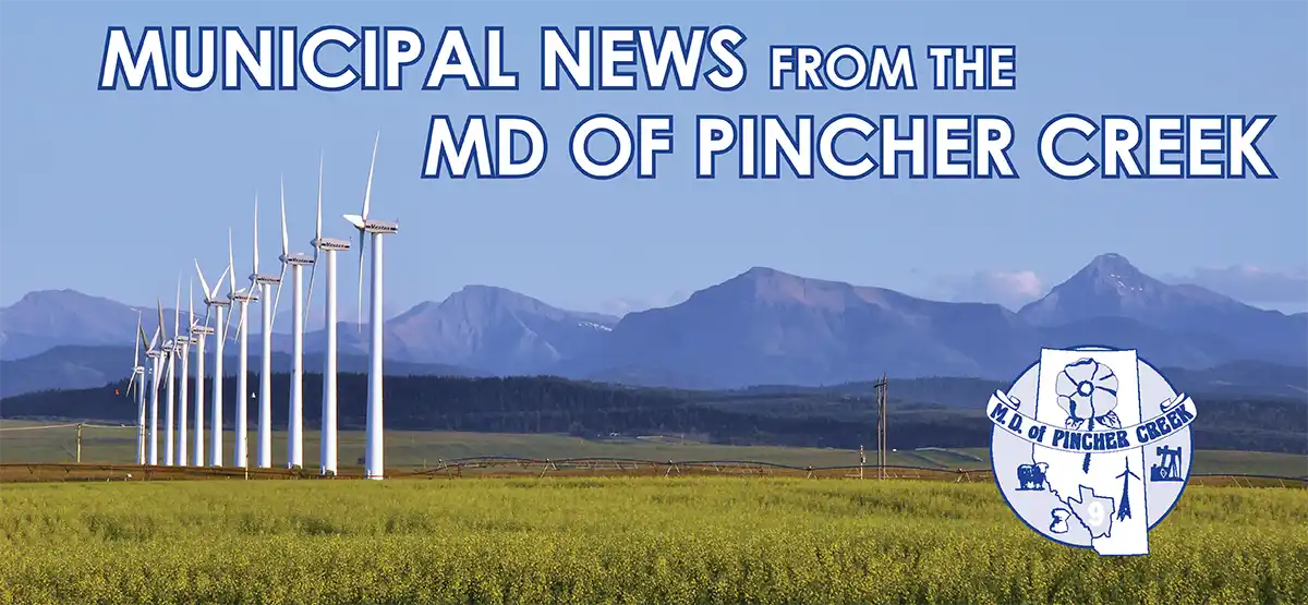 Graphic with the text "Municipal News from the MD of Pincher Creek" across the top, featuring an image of large windmills in a field with mountains in the background.